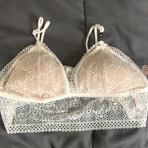 NWT VS pullover cream bralette. Light privacy pads. Delicate lace lovely!